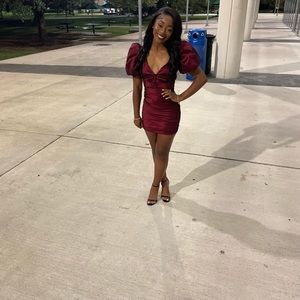 selling this maroon oh poly dress